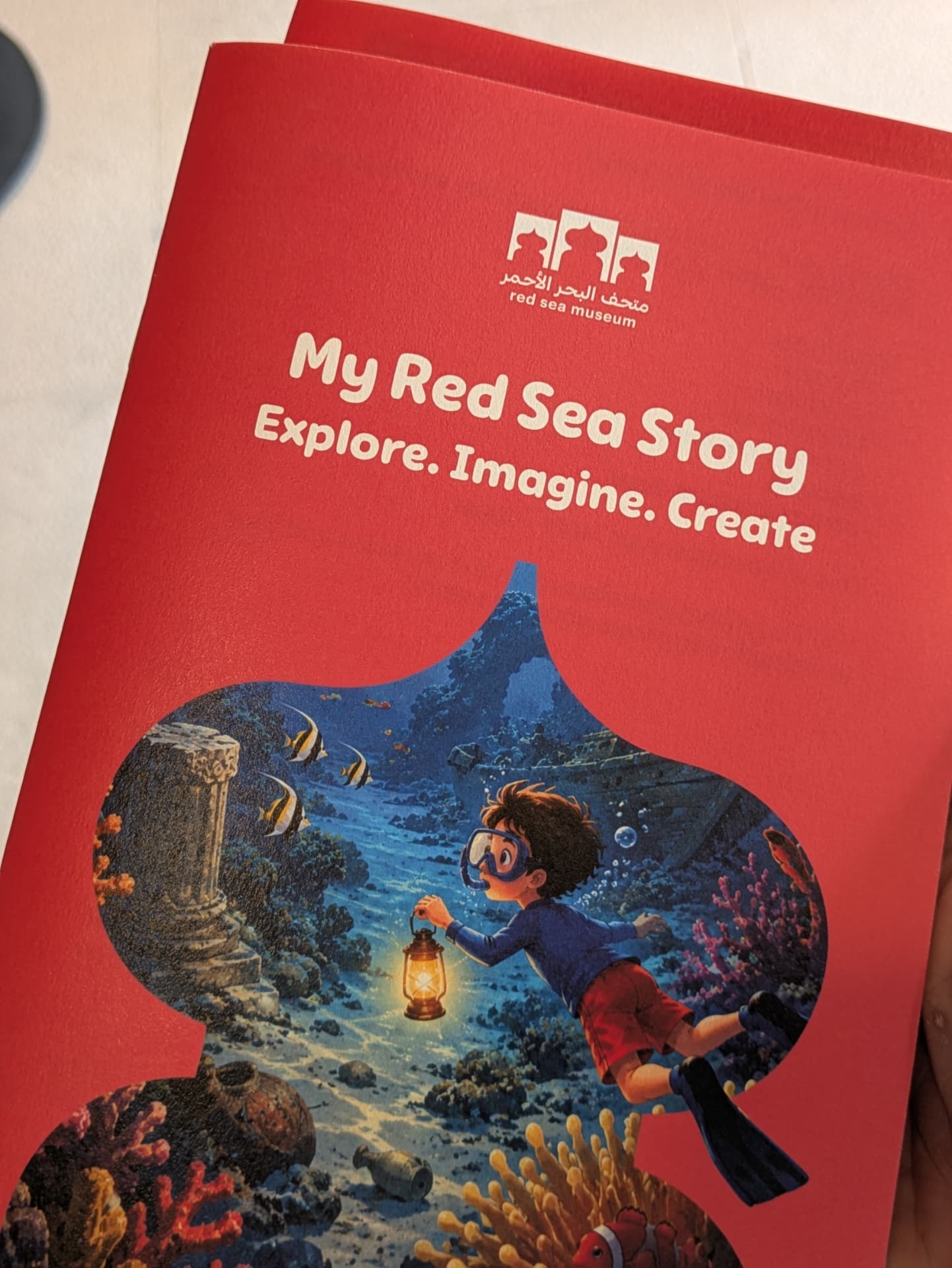 Close-up of the My Red Sea Story book cover created by a young author